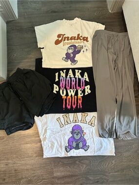 Inaka Power bundle of three t-shirts, one pair of shorts, and one pair of pants